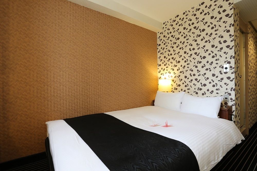 Apa Hotel Okayama Ekimae Екстер'єр фото